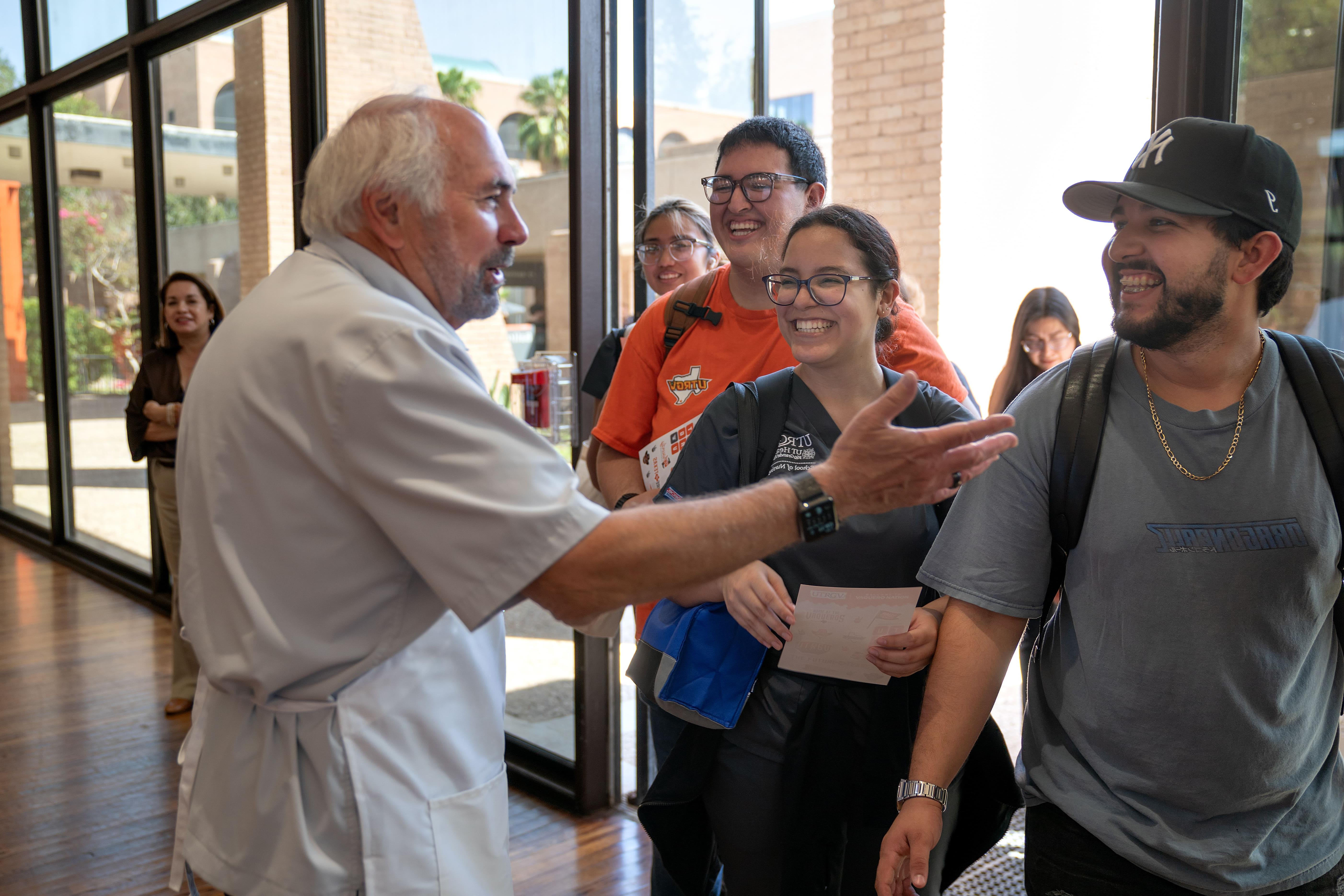 President Bailey welcoming students to event.